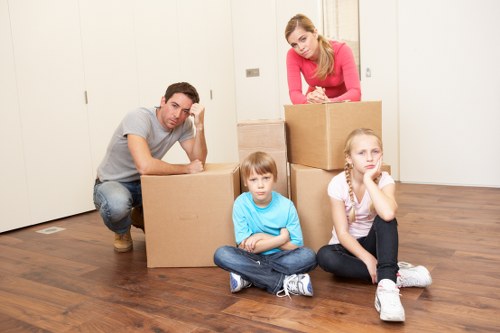 Local packing service team preparing belongings for transport